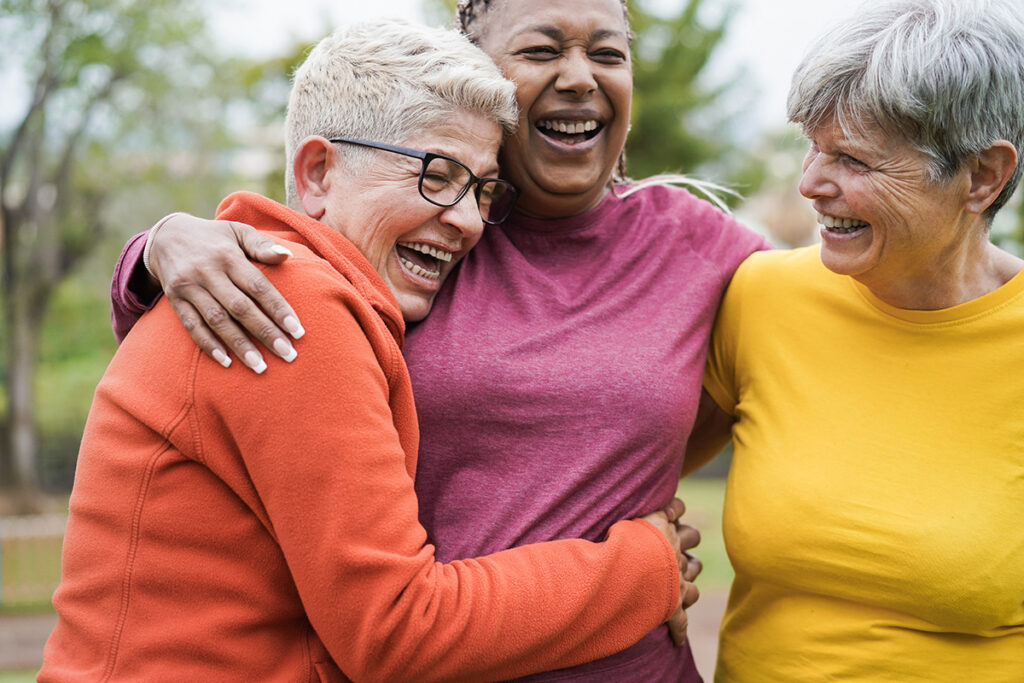 Three ladies support each other through alcohol addiction recovery